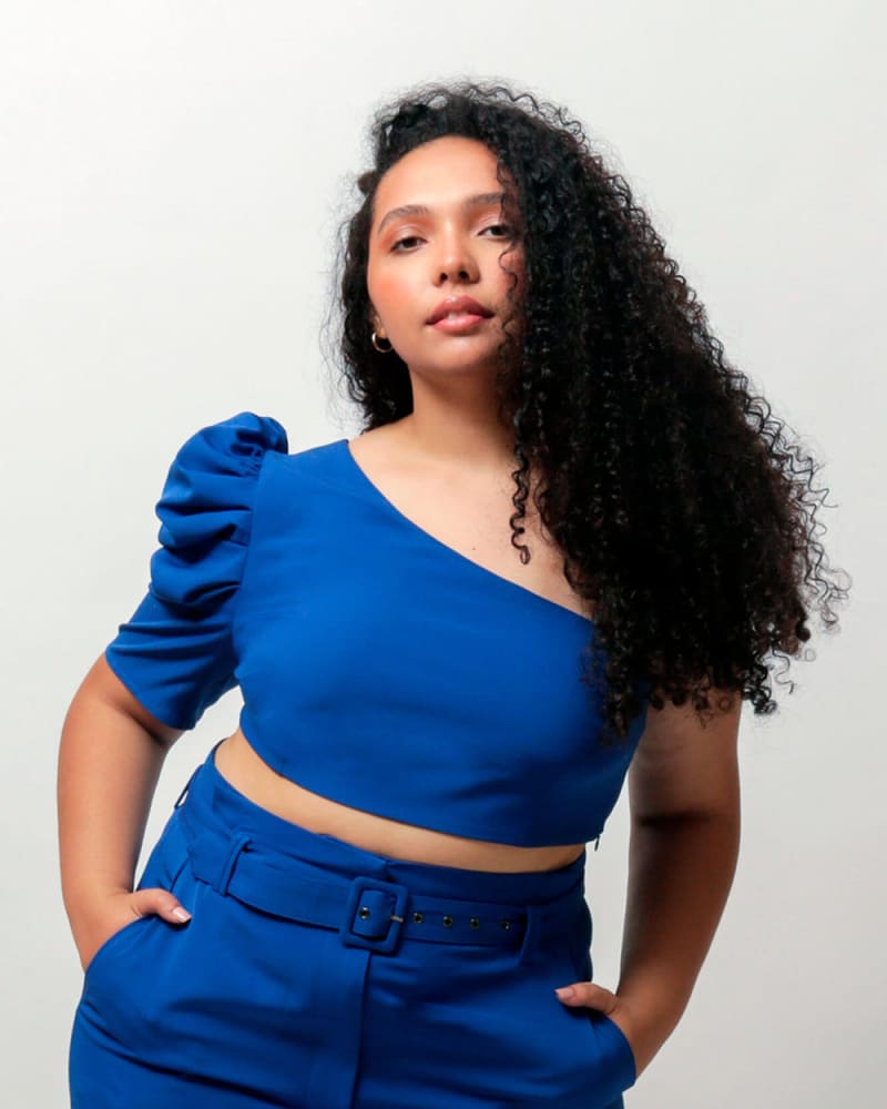 Front of a model wearing a size 1X (16W/18W) Hazel Crop Top in Princess Blue by LuvMeMore. | dia_product_style_image_id:266640